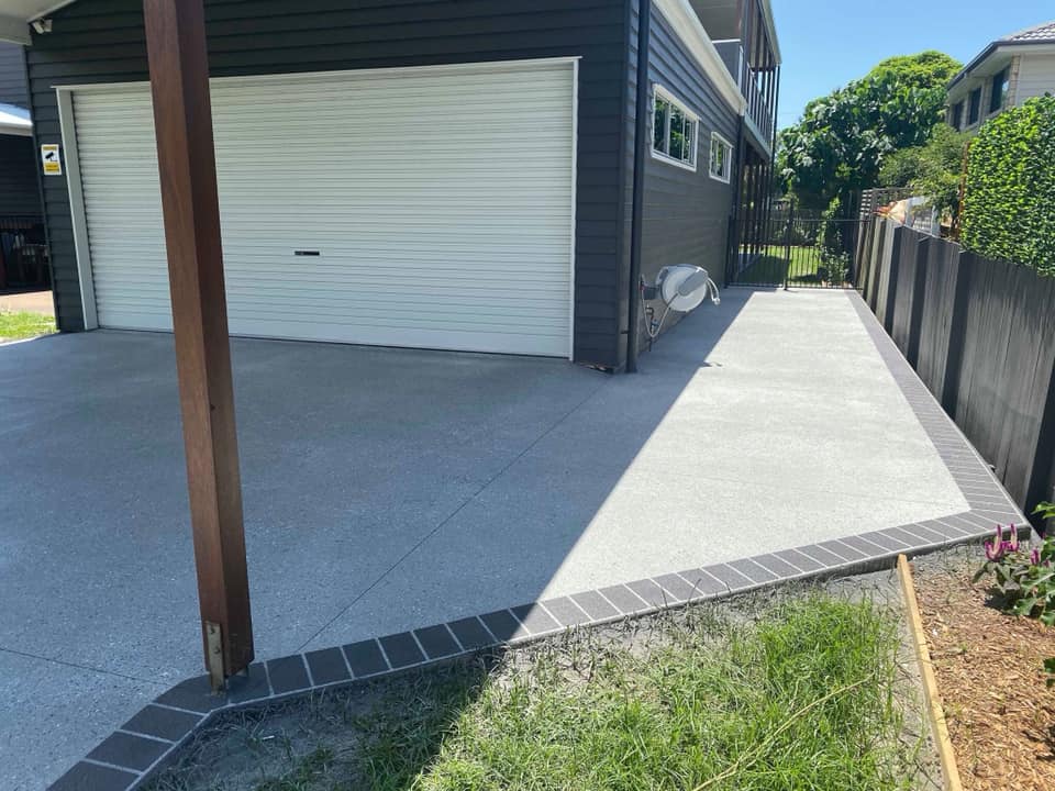 Concrete garage slab and driveway access